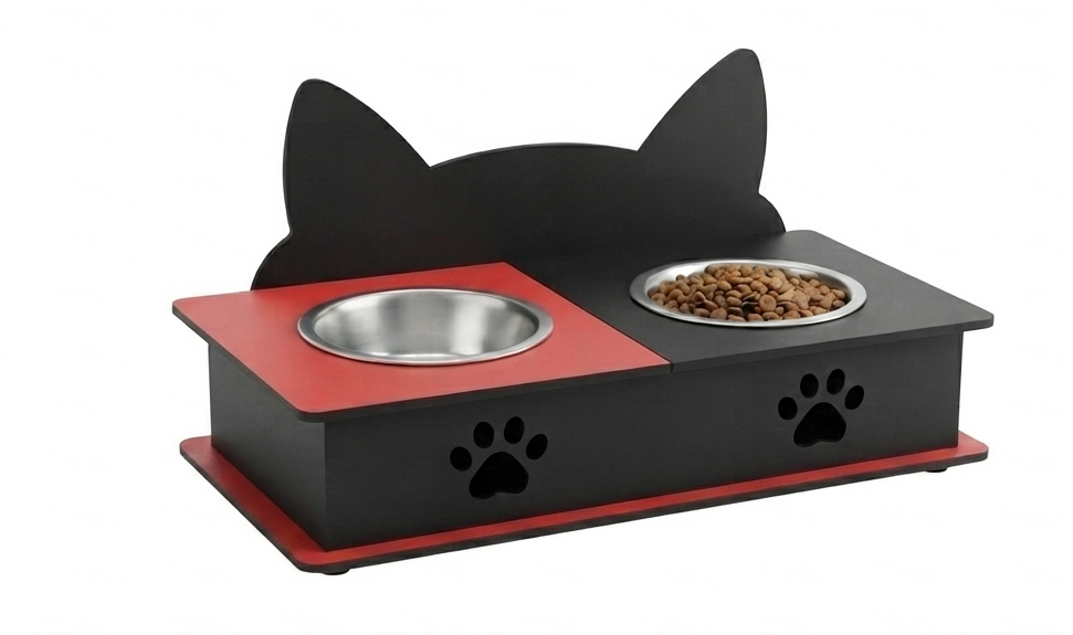A black cat-shaped elevated pet feeder and water bowl stand with red accents, featuring two stainless steel bowls (one empty, one filled with dry food) on a white background.