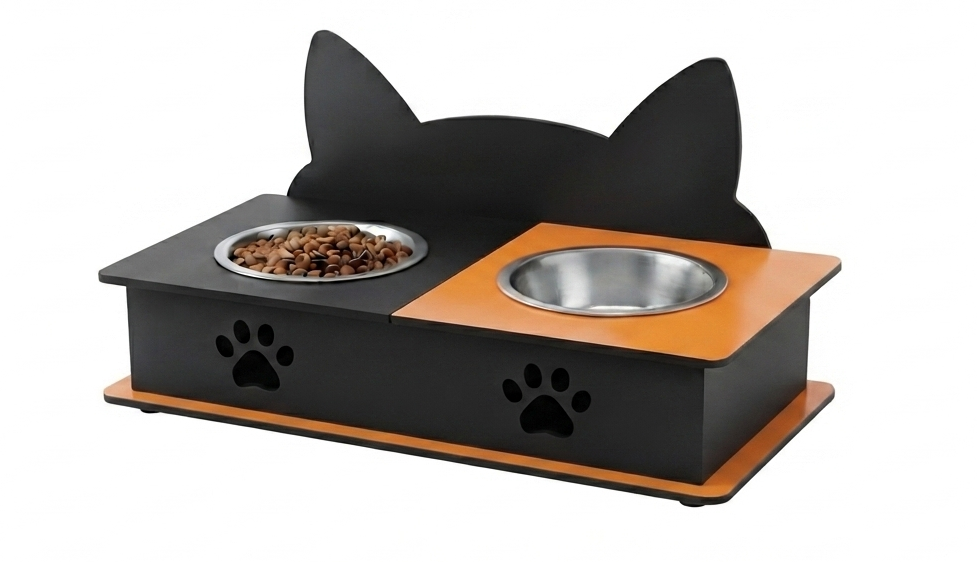A black and orange cat-shaped elevated pet feeder and waterer with two bowls, one filled with dry food, shown on a plain white background.