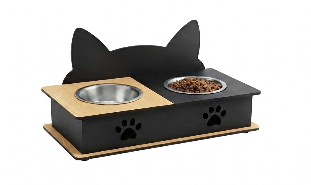 A black cat-shaped elevated pet feeder and water bowl stand with a light wood base and stainless steel bowls, shown on a white background.