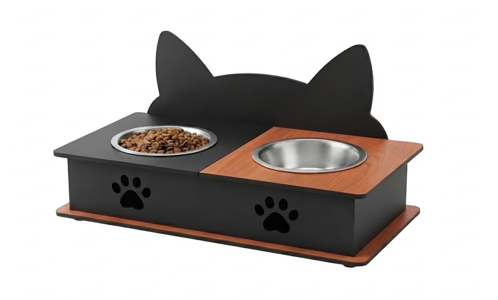 A black cat-shaped pet feeder and waterer with stainless steel bowls, one filled with dry food, set against a plain white background.