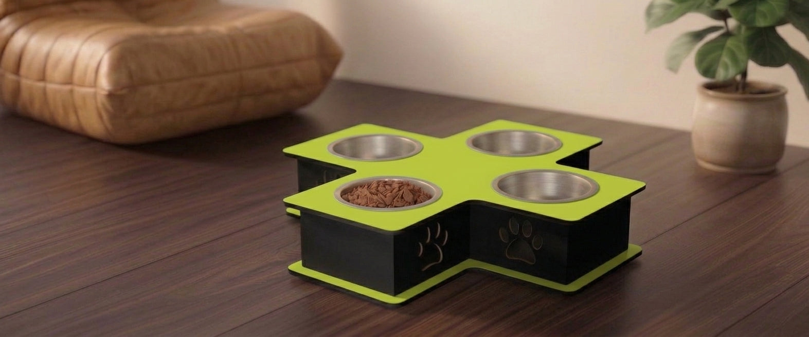 A four-bowl elevated pet feeder and waterer with a bright lime green top and black base, styled on a dark wood table in a home setting.
