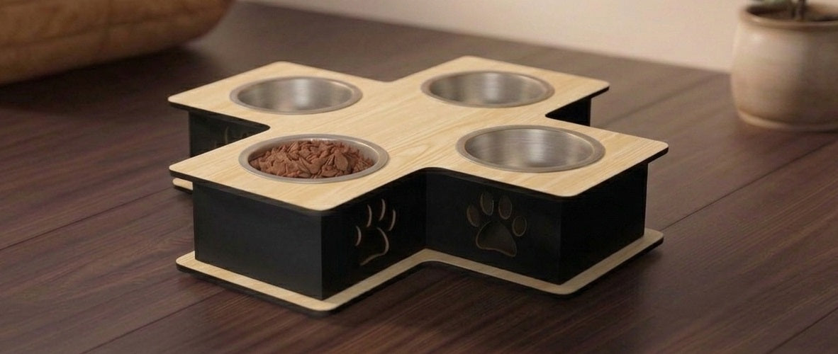 A four-bowl pet feeder and waterer stand made of light natural wood and black metal, shown on a dark wooden tabletop with food in one bowl.