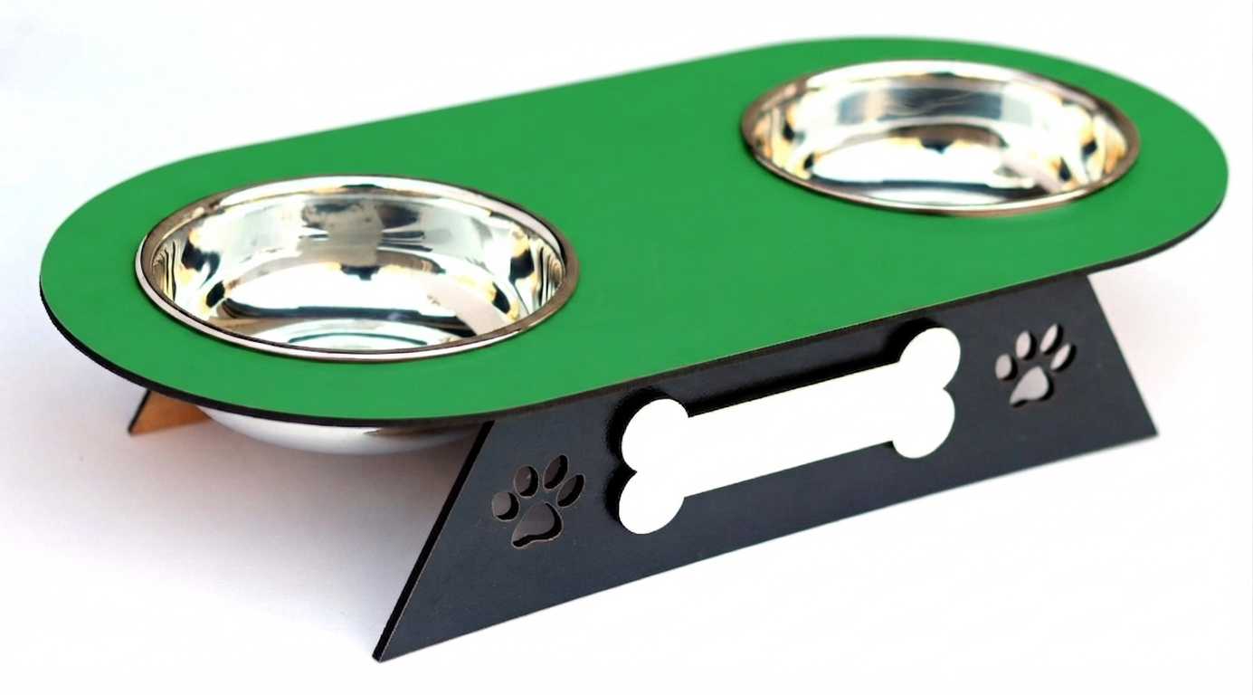 A pet feeder and waterer double bowl stand with a green top plate, two stainless steel bowls, and a black metal base with bone and paw print cutouts.